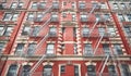 Old red brick building with iron fire escapes, New York City, USA Royalty Free Stock Photo