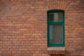 Old red brick city blind wall with window