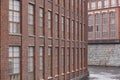 Old red brick facade factory buildings in Tampere, Finland.