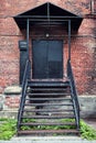 Industrial building entrance facade with red brick walls Royalty Free Stock Photo