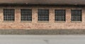 Red brick industrial building with large windows Royalty Free Stock Photo