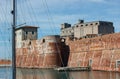 Old red brick pirate fortress on a sea