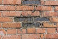 Old red brick. Texture of an old brick wall.The brick wall is covered with moss in places Royalty Free Stock Photo