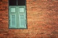 Old brick Wall with blue Window,Vintage style background Royalty Free Stock Photo