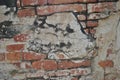 Old Red Brick Wall with Cracked Concrete Background Texture. Royalty Free Stock Photo