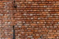 Old red brick wall damaged lightning rod collapsing brick wall Royalty Free Stock Photo