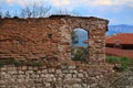 Old red brick wall, house ruins, empty window Royalty Free Stock Photo