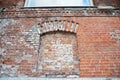 Old red brick wall inside of a vault or arch. Without Windows and doors Royalty Free Stock Photo