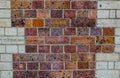 Old red brick wall pattern with white brick border. Royalty Free Stock Photo