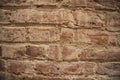 Old red brick wall, old texture of red stone blocks Royalty Free Stock Photo