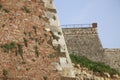 Old red brick wall with vegetation green grass Royalty Free Stock Photo