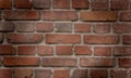 Old red brick wall with vignette texture background Royalty Free Stock Photo