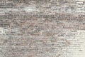 Old red brick wall with white paint background texture Royalty Free Stock Photo