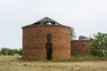 Old red brick water towers. Ruined building of the last century