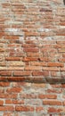 Old red bricks - fragment of the building wall Royalty Free Stock Photo