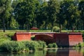 Old red bridge in the city Dobrush, Belarus.