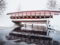 Old red bridge in winter Royalty Free Stock Photo