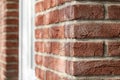 Old red brown brick wall with diminishing perspective. Detail of brick house Royalty Free Stock Photo
