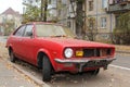 old red car in the city 3