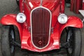 Old red car. Headight and red hood. Royalty Free Stock Photo