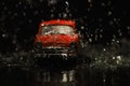 Old red car in rain Royalty Free Stock Photo