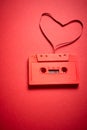 Old red cassette tape on a minimalist background Royalty Free Stock Photo