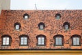 Old Red ceramic Shingles Roof with attic Windows. Royalty Free Stock Photo