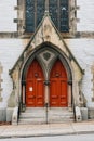 Old red church doors on Eutaw Place, in Baltimore, Maryland Royalty Free Stock Photo