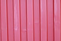 Old, red, crumpled, crimson metal sheet wall fence Royalty Free Stock Photo