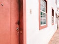 Old red door in baroque rococo colonial city of ouro preto, Brazil