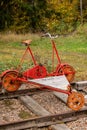 Old red draisine standing on a railroad track Royalty Free Stock Photo