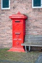 Old red Dutch mailbox Royalty Free Stock Photo