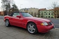 Old red elegant convertible car Mercedes Benz right side view Royalty Free Stock Photo