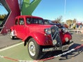 old red 1940s Citroen Traction Avant Legere in a park. Expo Fierro 2023 classic car show