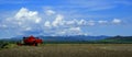 Old Red Farm Equipment in Country Farm Field Royalty Free Stock Photo