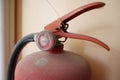 Old red fire extinguisher with dust Royalty Free Stock Photo