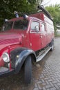 Old red fire truck parked in the netherlands