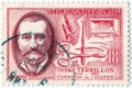An old red french postage stamp issued in 1957 with an image of octave terrillon the physician who pioneered aseptic surgery