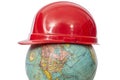 Old Red Hard Hat On Pre World War 2 Globe Royalty Free Stock Photo