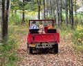 Old red Jeep on a forest road Royalty Free Stock Photo