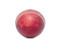 Old red leather cricket ball isolated against a white background Royalty Free Stock Photo