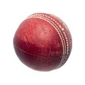 Old red leather cricket ball isolated against a white background. Royalty Free Stock Photo