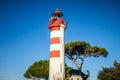 Old red lighthouse in La Rochelle harbor, France Royalty Free Stock Photo