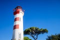 Old red lighthouse in La Rochelle harbor, France Royalty Free Stock Photo