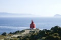 Old red lighthouse in Punta Robaleira, Cabo Home, Pontevedra, Spain Royalty Free Stock Photo