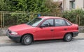 Old red Opel Astra sedan car parked Royalty Free Stock Photo