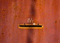 Old red painted metal door with number fifteen fractions two and mail hole Royalty Free Stock Photo