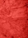 Old red paper parchment background design with distressed vintage stains on wrinkled creased grunge layout, red Christmas or valen Royalty Free Stock Photo