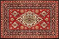 Old Red Persian Carpet Texture, abstract ornament Royalty Free Stock Photo