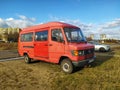 Old red rusty popular delivery van car Mercedes Benz 210 parked Royalty Free Stock Photo